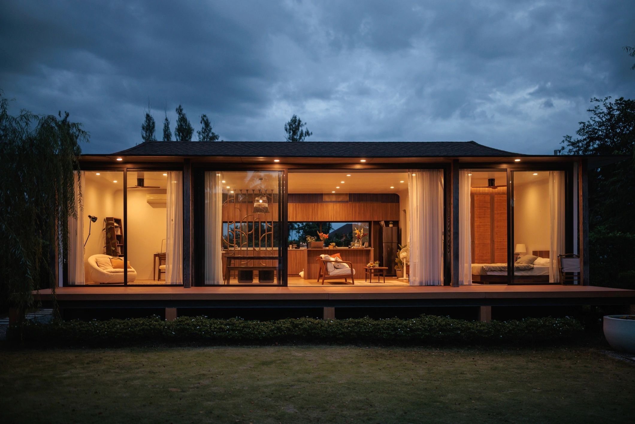 Modern luxury villa exterior at dusk